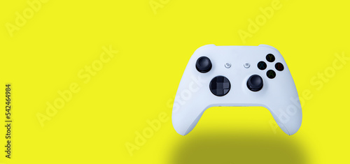 White controller of new video game console. On white background.