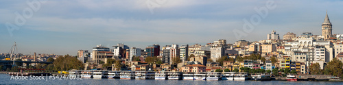 Fototapeta Naklejka Na Ścianę i Meble -  Panoramic view of Karaköy Pier ferry landing on the Golden Horn, east of the Galata Bridge