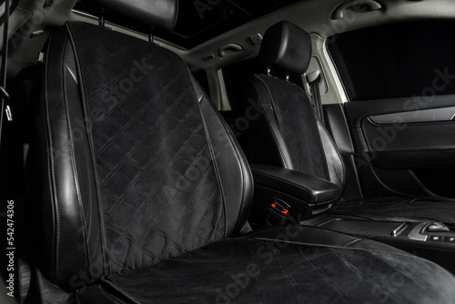 fabric seat cover in a car in a black interior