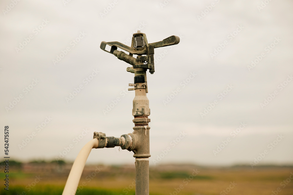 Close-up of a sprinkler irrigation system for the field Close-up of a sprinkler irrigation system for the field