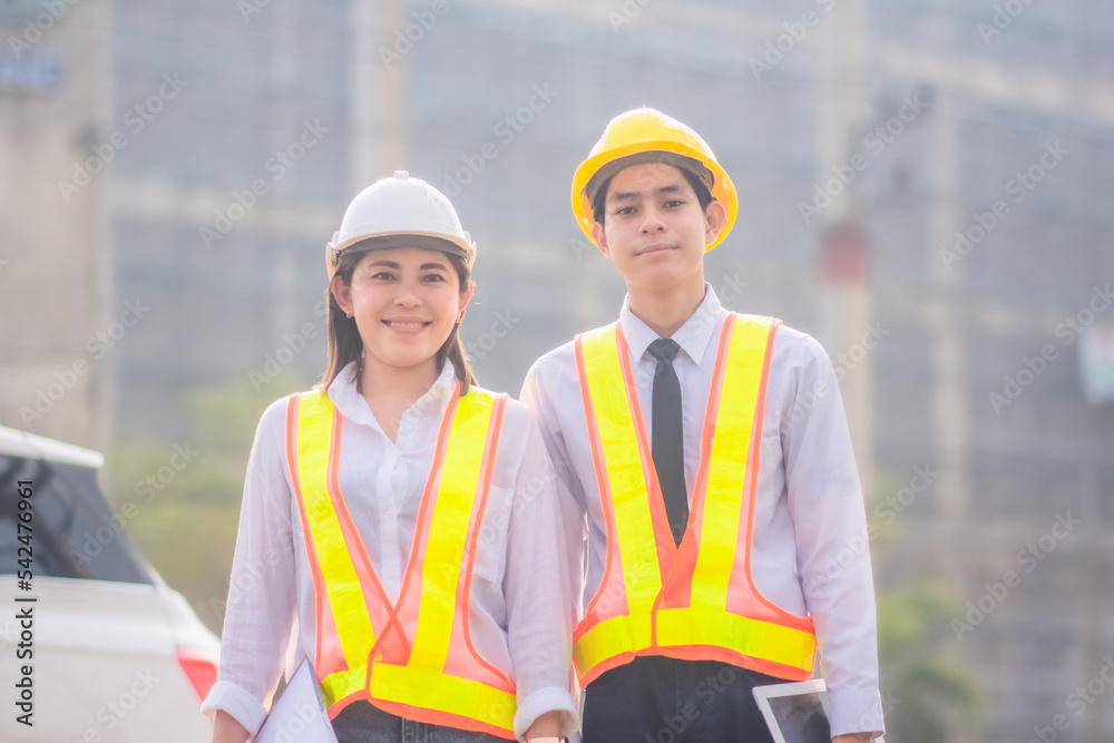Engineer Construction concept,Asian engineer construction teamwork standing on site construction building background, Engineer Construction design for Business building construction project Engineer Construction concept,Asian engineer construction teamwork standing on site construction building background, Engineer Construction design for Business building construction project
