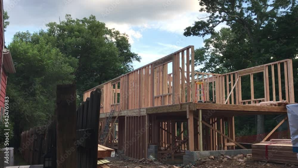 house building construction site with wood beams and timber in North America house building construction site with wood beams and timber in North America