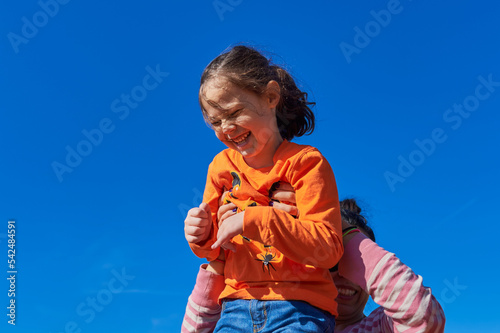 Kids playing at a farm fair on Halloween