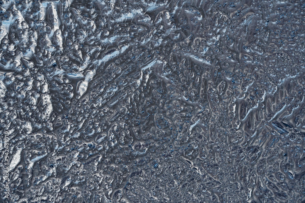 Cold Winter Frost Background frozen on Glass