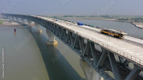 The Padma Multipurpose Bridge, commonly known as the Padma Bridge, is a two-level road-rail bridge across the Padma River, the main distributary of the Ganges in Bangladesh photo