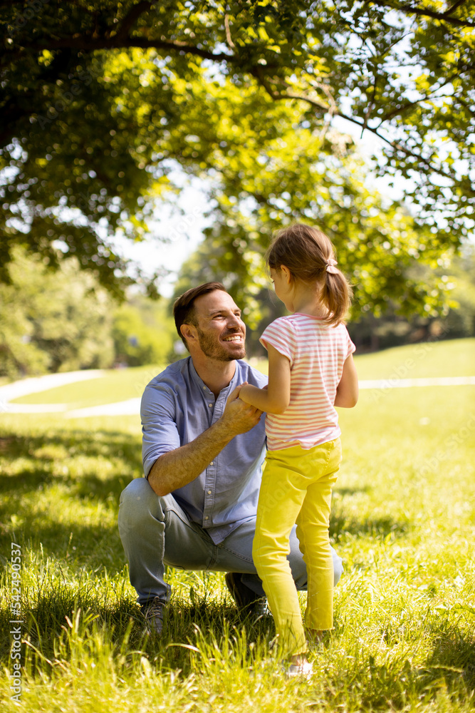 Father with daughter having fun at the park Father with daughter having fun at the park