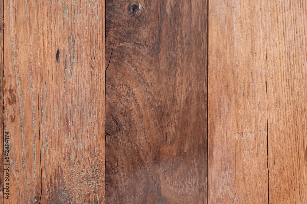 Naklejka premium Old wooden background with cracks. Structure of an old wood close up. Brown colored texture natural wood