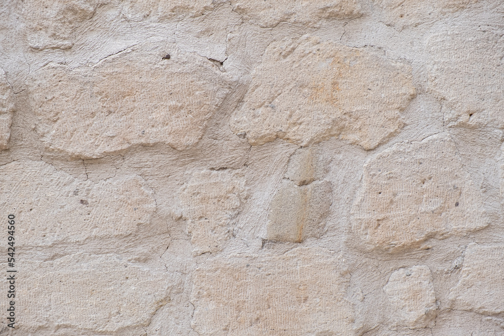 Detailed textured background of sandstone old wall with blocks light yellow colored texture Detailed textured background of sandstone old wall with blocks light yellow colored texture