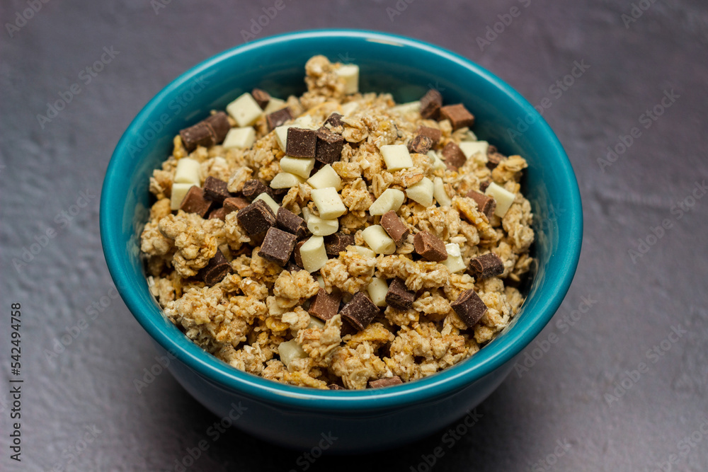 Chocolate granola cereals in bowl Chocolate granola cereals in bowl