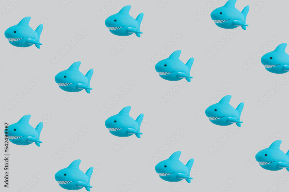 Pattern made of shark toys. Pattern made of shark toys.