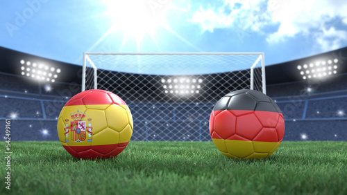 Two soccer balls in flags colors on stadium bright blurred background. Spain and Germany. 3d image