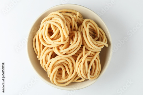 Murukku is a savoury snack popular in south India and Sri Lanka. murukku also known as chakli south indian traditional vegetarian snack photo