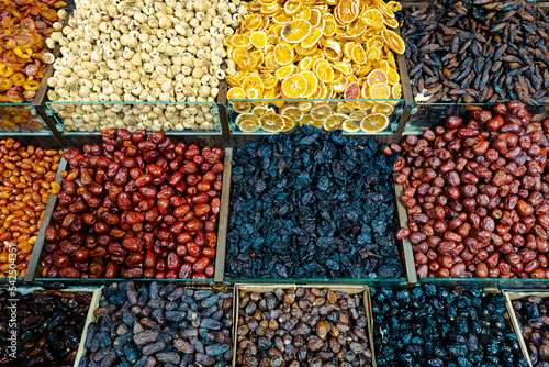 Eastern Bazaar. Nuts, Spices and Sweets. Traditional Azerbaijani Cuisine Ingredients. Dried fruit and herbs at the local market in Baku, Azerbaijan.