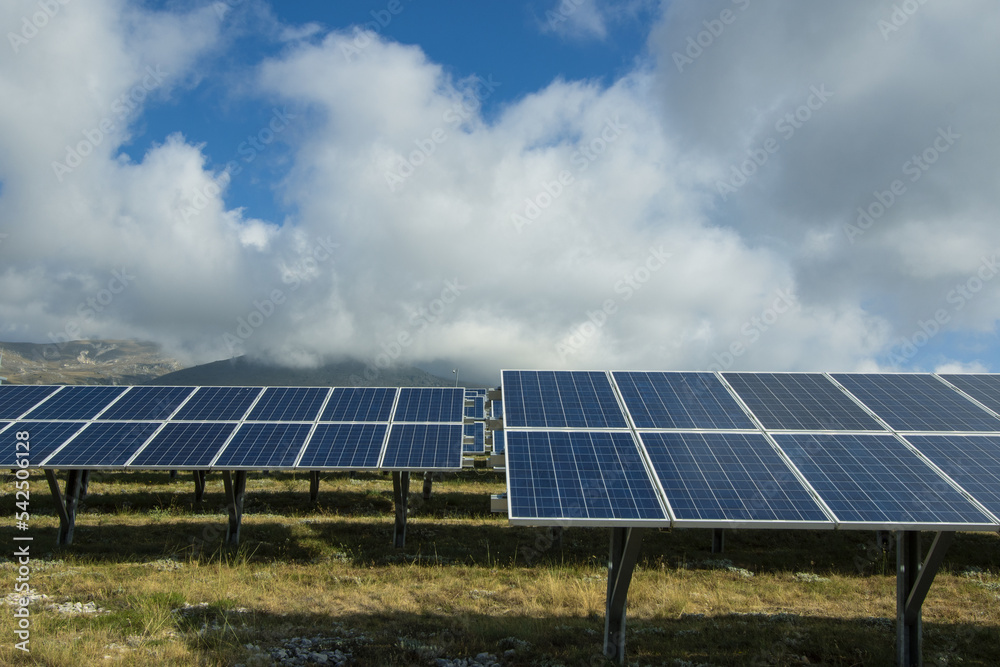 A photovoltaic system. Power system for solar power by means of photovoltaics. Popular sustainable, renewable energy. Smaller impact on the environ A photovoltaic system. Power system for solar power by means of photovoltaics. Popular sustainable, renewable energy. Smaller impact on the environ
