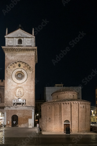 The Palazzo della Regione and the Clock Tower of Mantua illuminated at night