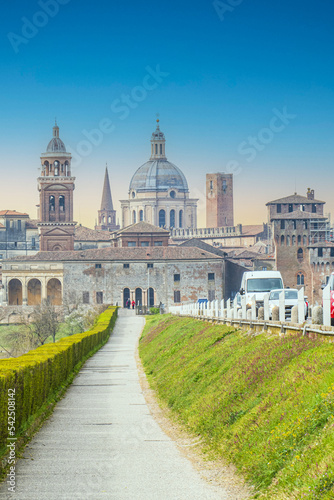 The famous cityscape of Mantua from the bridge over the Mincio at sunset