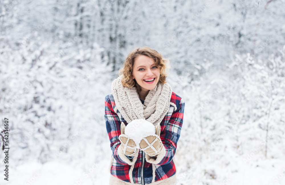 Fototapeta premium Happiness. Exciting winter photoshoot ideas. Snowflakes are tiny crystals. Snow games. Winter outfit. Snow makes everything outdoors look amazing. Woman warm clothes snowy forest. Nature covered snow