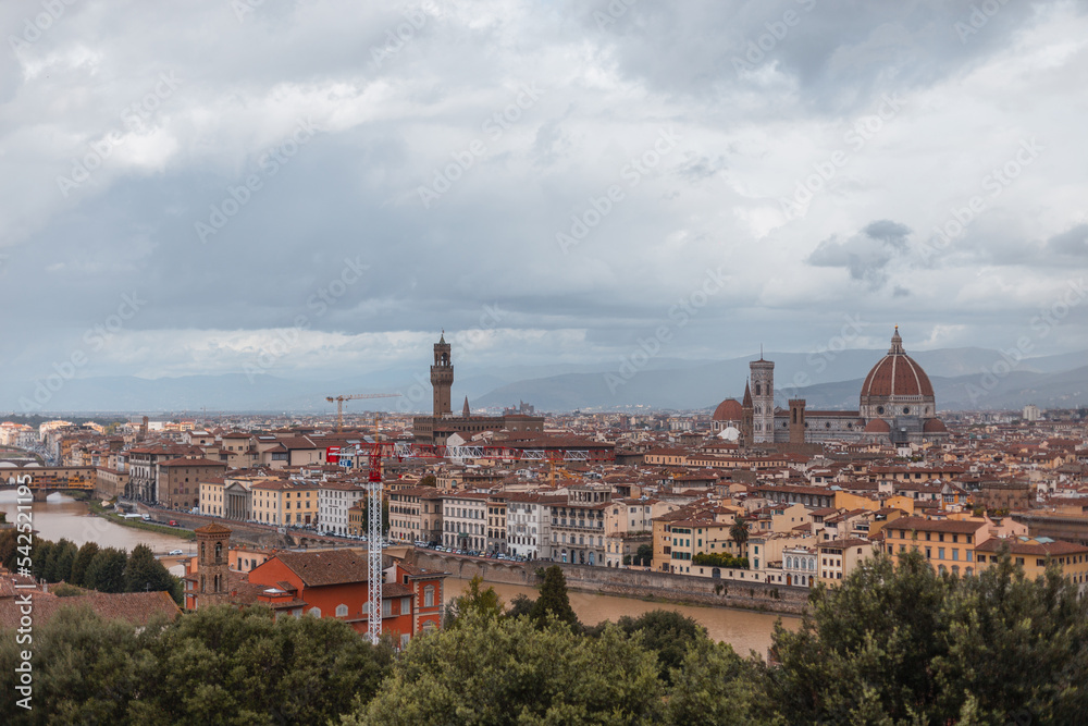 Beautiful vintage city of Florence, Italy with ancient houses and cathedrals on a cloudy day