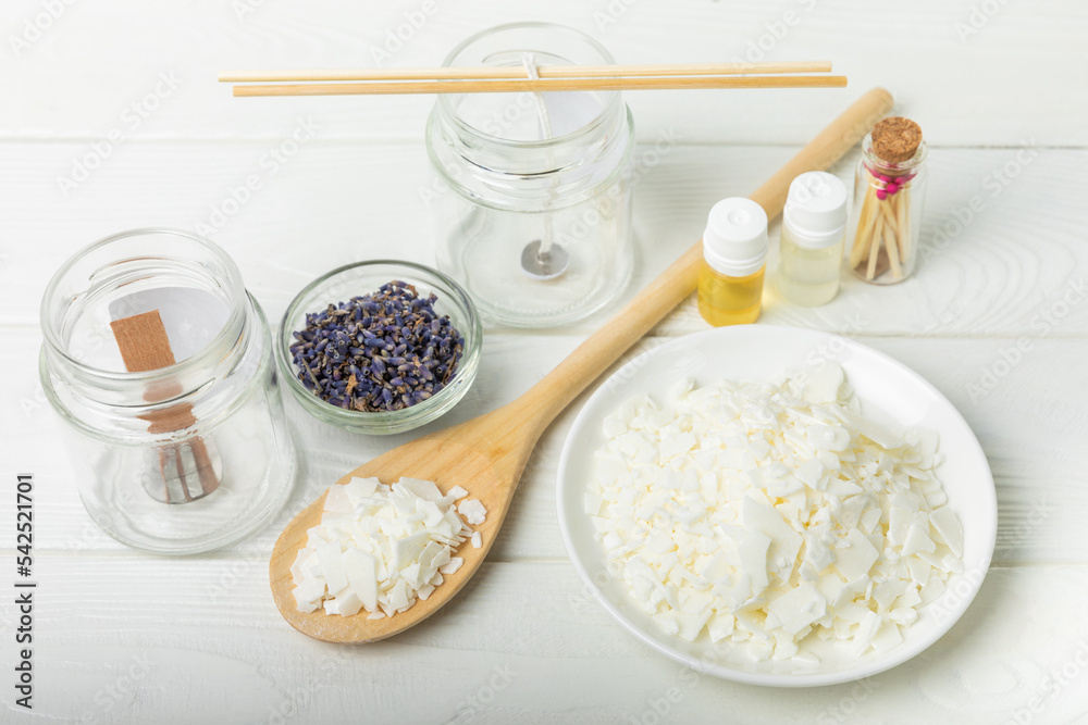 Set for homemade natural white eco-friendly soy wax candles in glass. Idea for hobby, business. Making fashionable candles with your own hands without harm to health.DIY candle. hobby concept