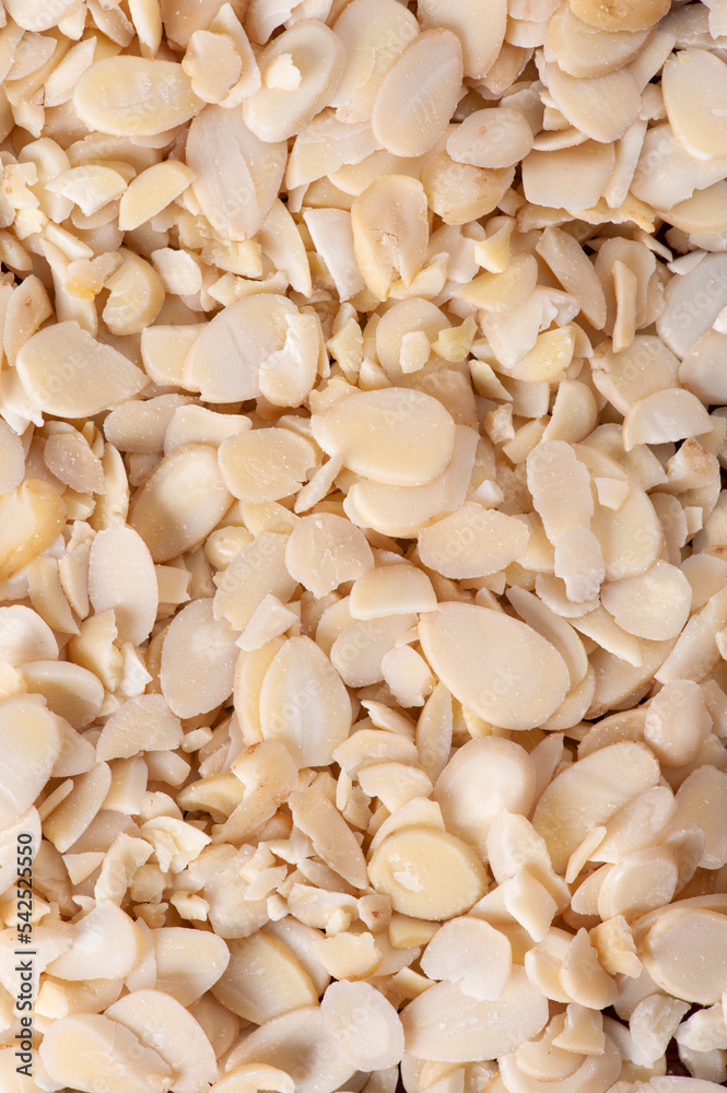 Sliced almonds background. Top view. Sliced almonds background. Top view.