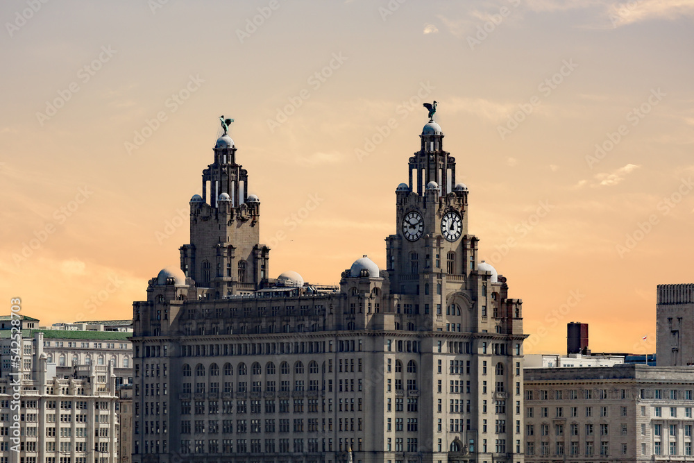 The famous Royal Liver Building as seen from New Brighton across the River Mersey. The two Liver Birds can be seen on top of the building