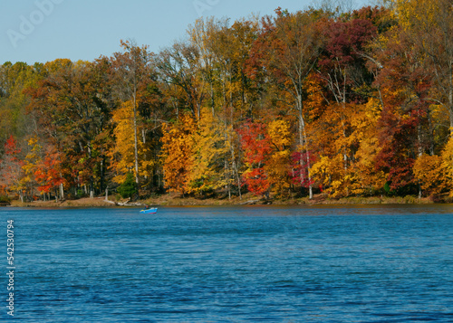 Clopper Lake in Seneca Creek State Park on a sunny autumn day photo