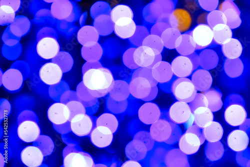 Christmas background with bokeh of colored lights. photo