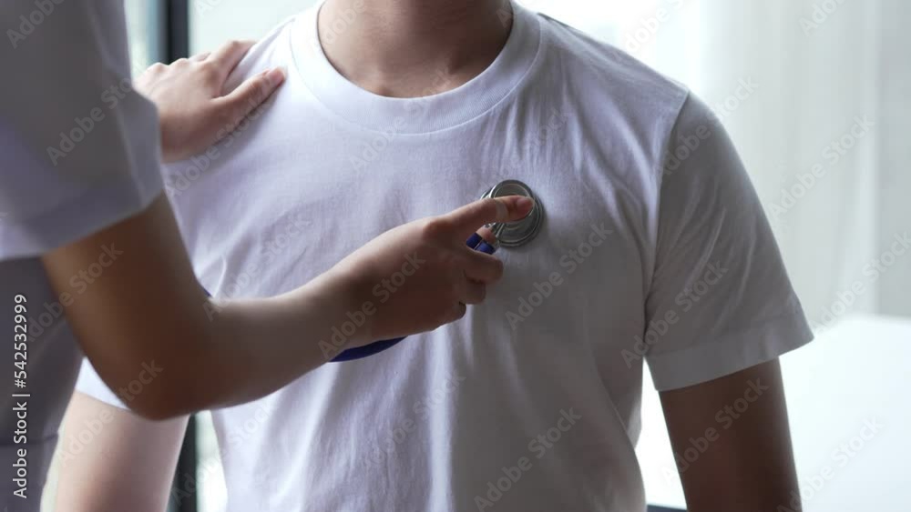 Healthcare concept, Female doctor using stethoscope with patient to examining lung and heart rate.