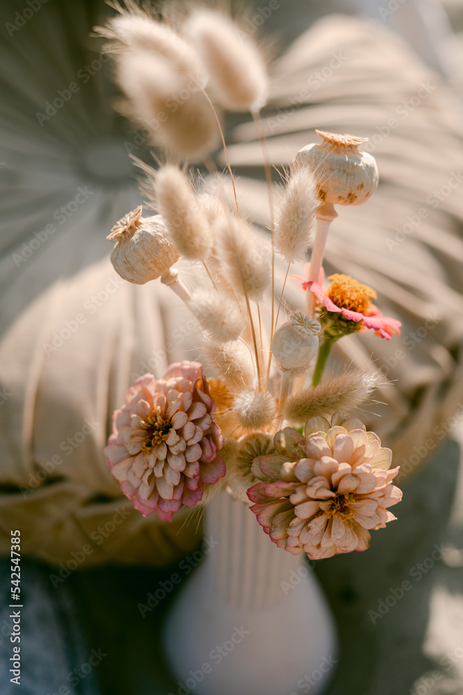 Pink and tan zinnia flowers with cottontail florals Pink and tan zinnia flowers with cottontail florals