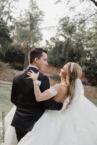 Wife and groom 
Groom carrying his wife