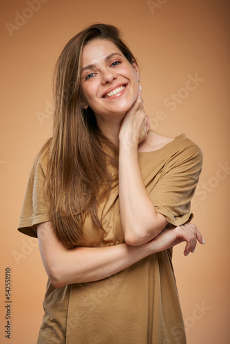Happy smiling woman in brown home male shirt. Isolated female portrait. Girl with long hair
