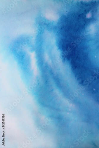 Abstract blue watercolor background. Hand-painted paper with blur and ombre effect. Blurred lines and spots. Background for the cover of a laptop, notebook.