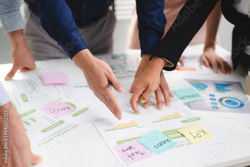 professional business marketing teamwork concept, group of businessman person startup team meeting and discussion a corporate strategy document paperwork, colleague brainstorming communication concept