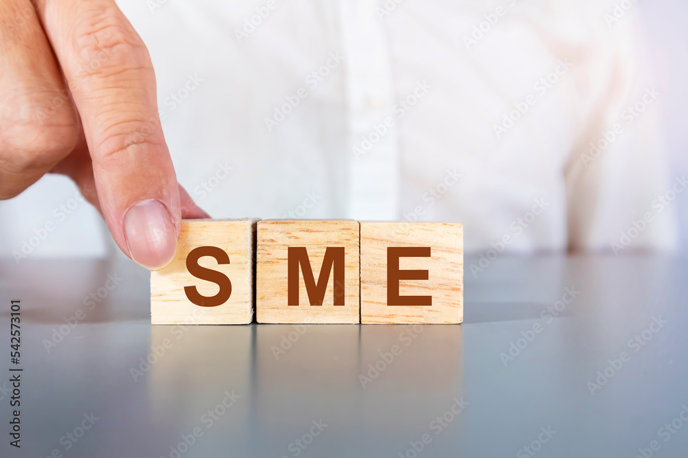 Naklejka premium sme letters on a wooden box,small business entrepreneurs
