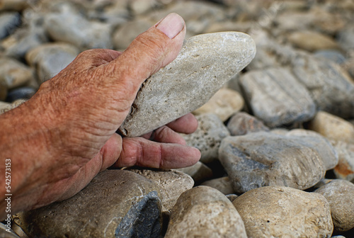 Turning over stones.