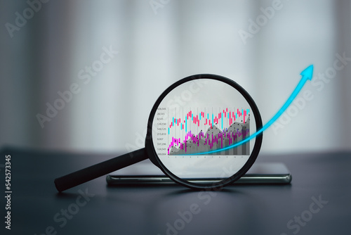 business finance technology and investment concept. Stock Market Investments Funds and Digital Assets. businessman analyzing forex trading graph financial data. Business finance background. photo