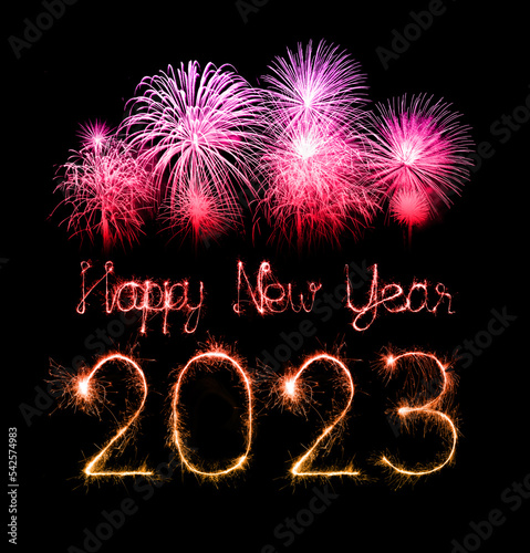 2023 happy new year fireworks celebration written sparkling at night.