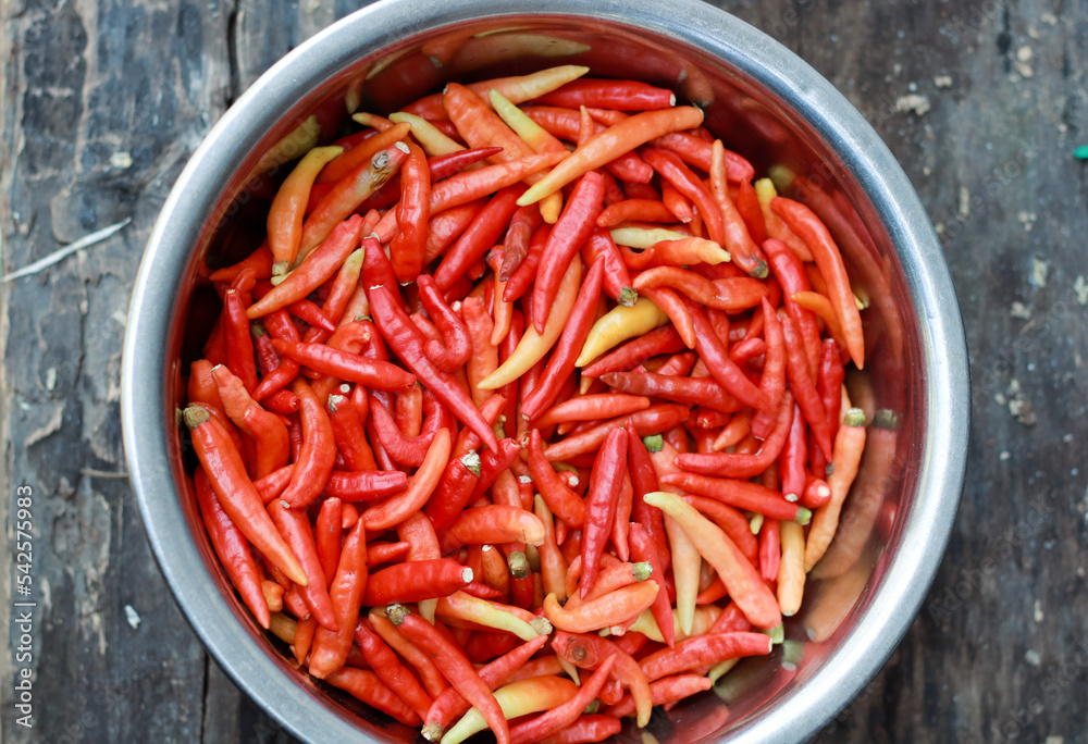 cayenne pepper, red hot chili on wooden table cayenne pepper, red hot chili on wooden table