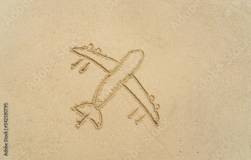 sandy beach with drawing in the sand or symbol.