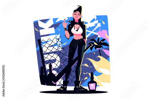 Pretty punk woman in stylish clothes showing rock