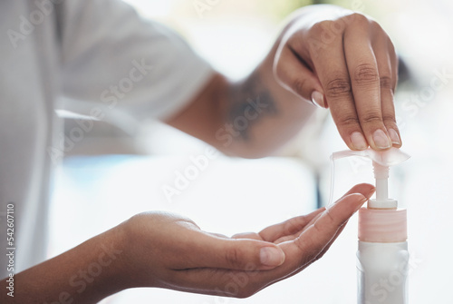 Hands, cleaning and soap with a black woman washing for hygiene alone in the bathroom of her home. Health, bacteria and liquid with a female disinfecting or sanitizing her hand and skin in a house