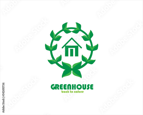 vector logo of a house or building that carries an environmentally friendly green theme