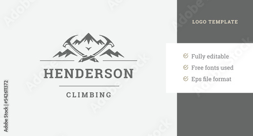Mountain hiking travel adventure with crossed climber crowbar vintage logo design template vector
