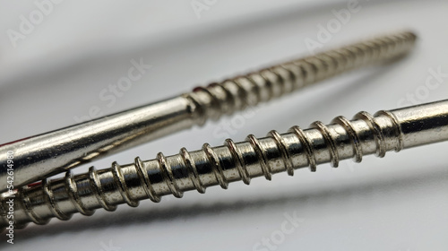 A screw from different perspectives on a white background