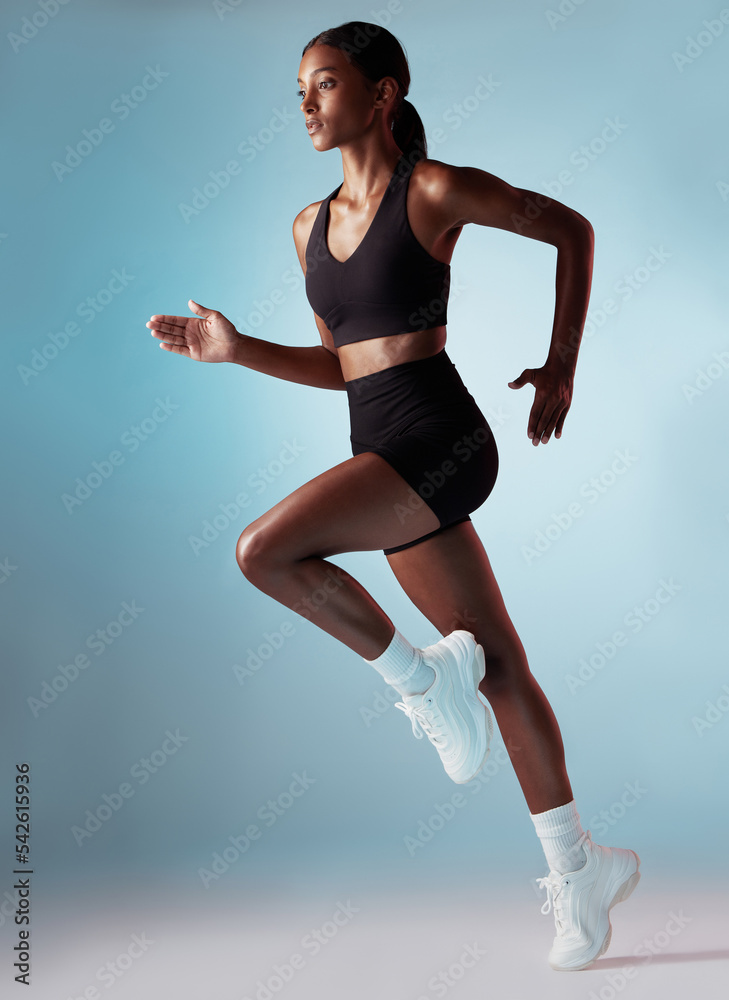 A Strong Athletic, Women Sprinter, Running on Dark Background