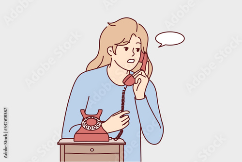 Young woman speak on old corded phone at home. Female have conversation on landline telephone. Communication and call. Vector illustration. 