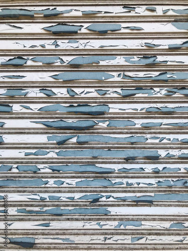 Vintage background with peeling paint. Textured background. Natural damaged wall.