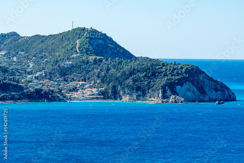 A view from the sea of the holiday resort Agios Nikitas, Lefkada, Greece. photo