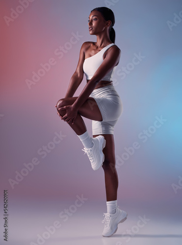 Принти на полотні Black woman fitness, stretching in studio with sportswear or sports fashion in fitness exercise for knee and legs