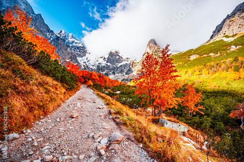 Hiking in national park High Tatras. HiIking from white lake to Green lake in the mountain landscape, Zelene pleso, Slovakia. photo